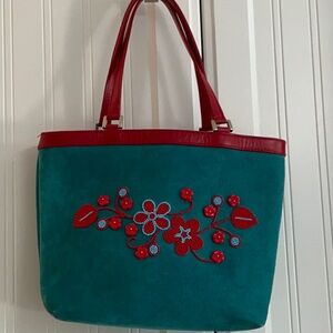 Isabella Fiore collectable hand beaded suede purse. Leather handles/trim